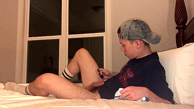 Jockstrap-clad college frat boy Jesse Gold stroking in style