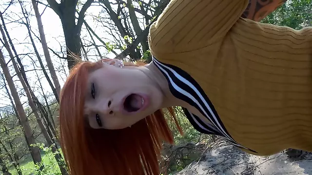 Smoking hot redhead rides big fat dong in the woods