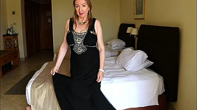 Elegant Intrigue: Busty Gilf Mariaolds Black Dress And Stockings Mystery