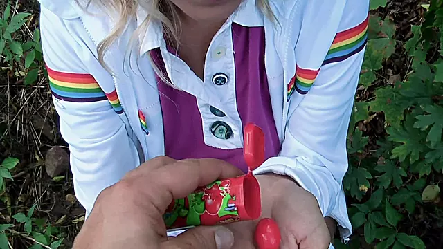 Stunning blonde teen blows bubble gum and swallows cum from stranger in the public park